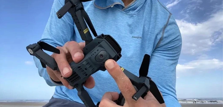 Stealth Bird 4K man showing the camera of his drone